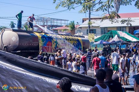 Mojaderas douse a crowd of Carnival revelers in Bocas del Toro, Panama