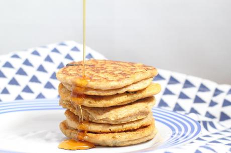 Pouring Maple Syrup on Vegan Pancakes