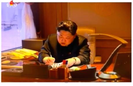 Image of Kim Jong Un authorizing the launch of Kwangmyo'ngso'ng-4 shown during a special news bulletin on Korean Central Television on February 7, 2016 (Photo: KCTV screengrab).