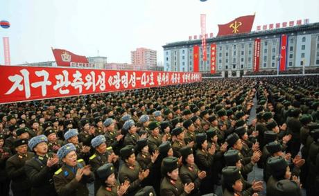 KPA service members applaud during a February 8, 2016 mass rally celebrating the successful launch of the KMS-4 (Photo: Rodong Sinmun).