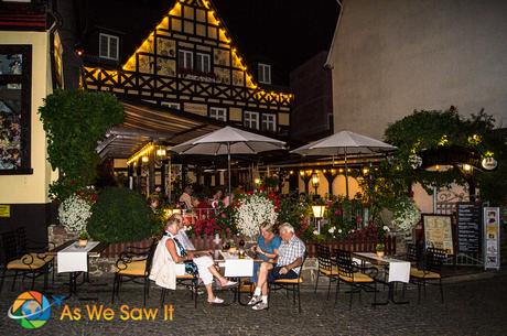 I’m Sailing Away on a Rhine River Cruise Cafe at night in Rudesheim, Germany.