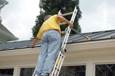gutter cleaning with ladder