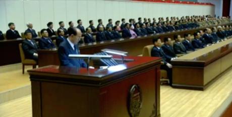 Central Report Meeting Commemorates KJI’s Birth Anniversary Kim Yong Nam delivers the report at a February 15, 2016 national meeting to mark KJI's birthday (Photo: KCTV screengrab).