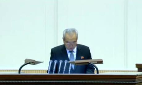 Central Report Meeting Commemorates KJI’s Birth Anniversary WPK Secretary Kim Ki Nam presides over a February 15, 2016 national meeting commemorating the birth of late DPRK leader Kim Jong Il (Photo: KCTV screen grab).