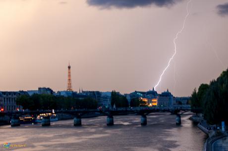 Lightning along the Seine River in Paris, France.
