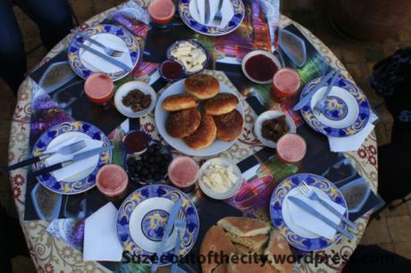 Morocco’s Best City: Is it Fez or Marrakech? Our breakfast feast on the Dar's rooftop terrace, including heavenly strawberry juice.