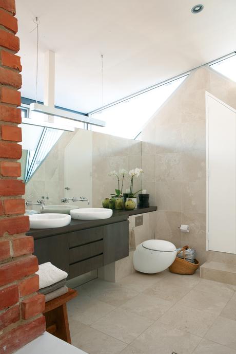 Il Bagno Alessi sink and toilet in master bathroom 
