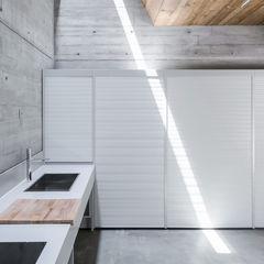 A Half-Buried Home Fights for Sunlight A Half-Buried Home Fights for Sunlight