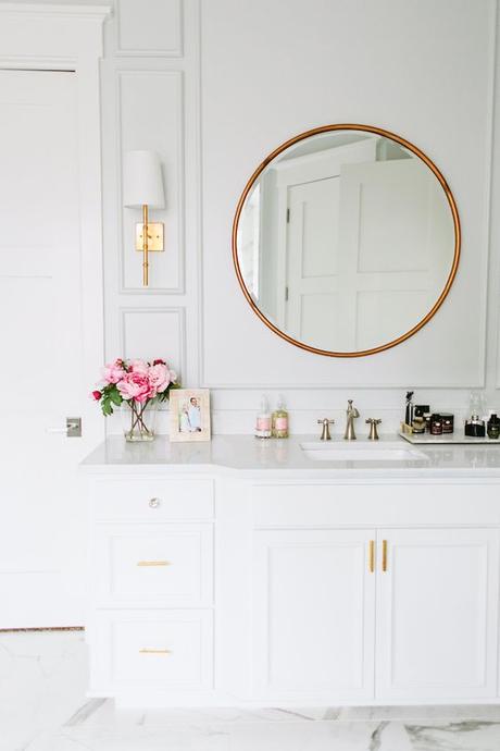 Gorgeous bathroom makeover! Love the marble, white and gold combo.: 