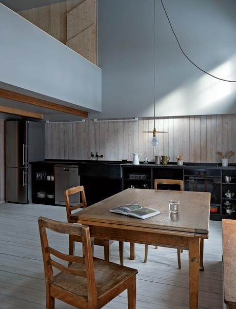 Swiss family getaway small space renovation with Ize pendant in dining kitchen area