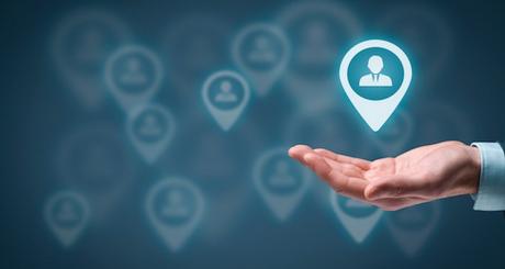 Achieve Marketing Goals with Facebook Advertising Target audience and customers concept. Man hold target customer in hand, target audience in background.