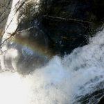 A rainbow over the thundering waters inside the mountain