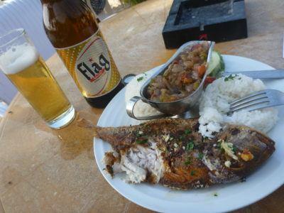 Friday’s Featured Food: Barbecued Fish and Flag Beer on N’Gor Beach, Dakar, Senegal Friday's Featured Food: Barbecued Fish and Flag Beer on N'Gor Beach, Dakar, Senegal