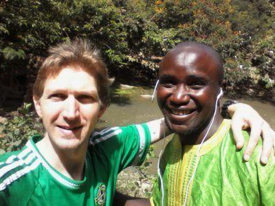 Stroking Crocodiles at Kachikally Pool, Bakau, The Gambia Zachariah and I - my driver