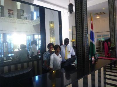 My Five Star Paradise: Living It Up at the Coco Ocean Resort and Spa, The Gambia Smiling staff on reception.