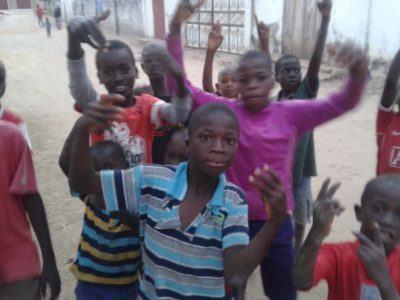 Staying at the Banana Lodge Apartments in Brufut Village, The Gambia Playing football with kids near Banana Lodge, The Gambia