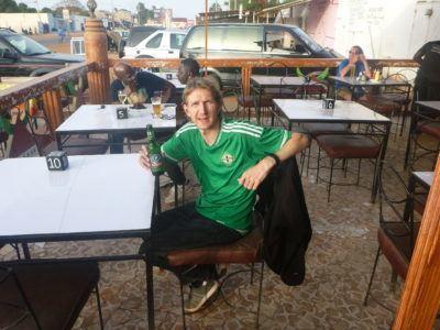 Staying at the Banana Lodge Apartments in Brufut Village, The Gambia Relaxing in Brufut with a beer