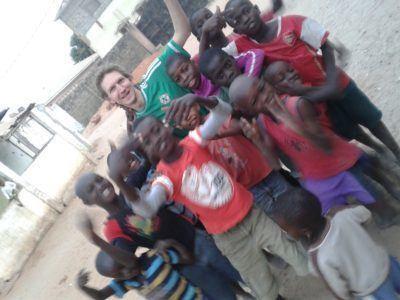 Staying at the Banana Lodge Apartments in Brufut Village, The Gambia Playing football with kids near Banana Lodge, The Gambia