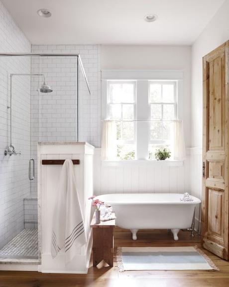 Beautiful bathroom's with tubs! A refurbished 1930s claw-foot bathtub (Appalachian Tubs, 770-324-8701) is a quaint spot to soak in the suds and the sunshine. It's also the perfect country counterpoint to the modern walk-in shower.: