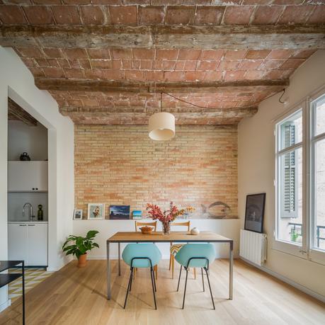 Barcelona apartment with a historic chamfered ceiling