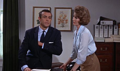 From Russia With Love – Bond’s Dark Navy Office Suit Moneypenny takes Bond to task after M cock-blocks him via intercom.