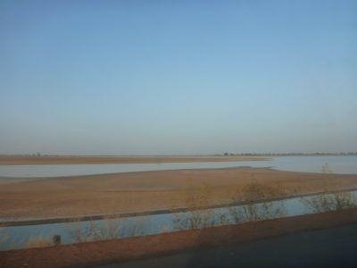 World Borders: My Crazy Adventure from Dakar in Senegal to Serrekunda, The Gambia River by the road between Foundiougne and Karang