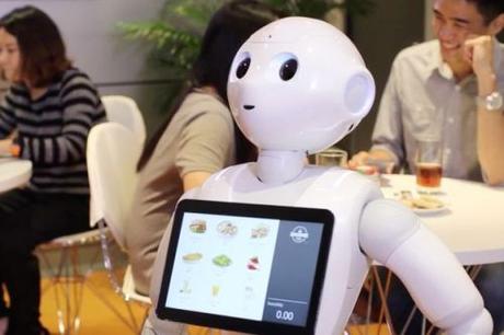 Minimum wage hikes hasten replacement of human workers by robots Pizza Hut's Pepper robot