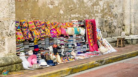 Colorful colonial Cartagena shown in its crafts available on city streets.