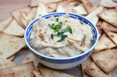 houmous or hummus made with toasted sesame oil and served with homemade corn tortilla chips