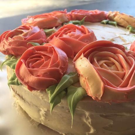 A ranunculus buttercream cake and an awesome b'day party