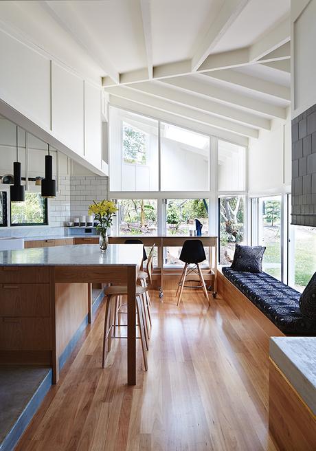 Modern timber house kitchen with blackbutt wood flooring