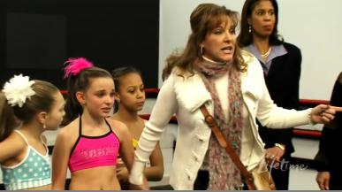 d1 Dance Moms: Attention All Units. Be On The Lookout For A Runaway Mom. Armed With Glitter And A Pittsburgh Poof. Considered Kinda Crazy.