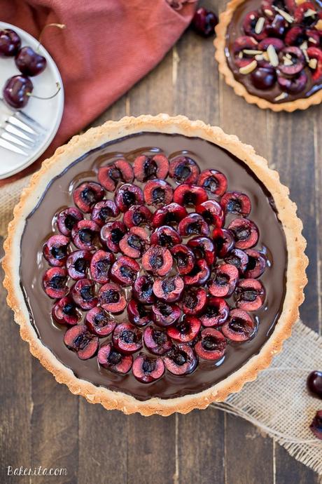 Chocolate Cherry Tart with Toasted Almond Crust (Gluten Free, Paleo + Vegan) This Chocolate Cherry Tart has a toasted almond shortbread crust filled with silky chocolate ganache and fresh cherries! This gluten-free, Paleo, and vegan dessert is incredibly rich and comes together quickly.