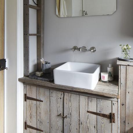 Rustic bathroom idea: custom vanity unit made from recycled wood, with antique mirror and square white butler sink / basin. Wall mounted taps for added effect. custom rustic bathroom vanity unit