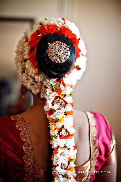 Simple South Indian Hairstyles for a Gracious Look Braid and Flower Wrap Hairstyle