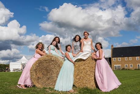 Rustic Wedding with Adam + Jaclyn bride posing with her bridesmaids