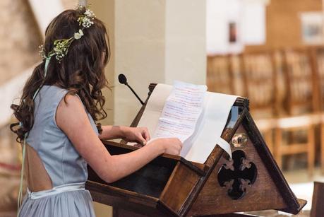 Rustic Wedding with Adam + Jaclyn flower girl giving a reading