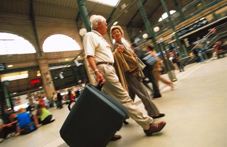 Mature couple in railway station