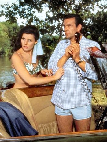From Russia With Love – Bond’s Gingham Shirt and Swim Trunks Eunice Gayson and Sean Connery as Sylvia Trench and James Bond, respectively, in From Russia With Love (1963).