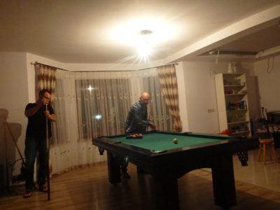 Backpacking in Poland: One Night in The Countryside Village of Rywałd, Pomerania Playing pool with Jacek and Bartek