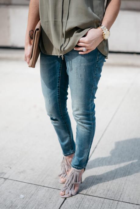 Transitioning from summer to fall with jeans. When transitioning from summer to fall with jeans it's important to mix different pieces that can balance each other. Mixing jeans with sleeveless tops and open toed shoes help keep your fall look light and airy. Click through to see more tips!