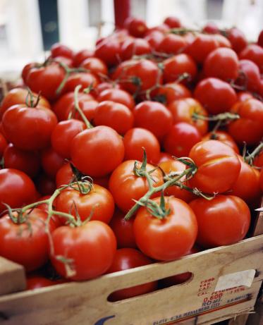 The Story of a Man with no E-Mail…. Fresh tomatoes in crates