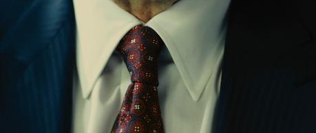Limitless – Van Loon’s Blue Striped Suit Couldn't ask for a better shot of the tie. You could probably get a better description than the one I provide, though.