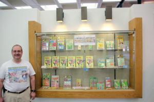 Pop Culture League first challenge: shelfie Harvey Mercheum items on display at the Schenectady County Public Library, front case.