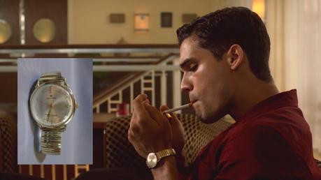 Magic City: Stevie’s Red Striped Shirt Constantly lighting up isn't keep his watch too hidden from the camera either.