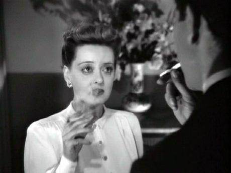 Charlotte & Jerry share a smoke together in the iconic final scene of Now, Voyager