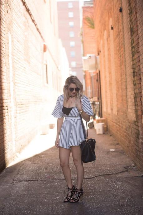 Striped romper from Mo and Cho Boutique; pair with a pair of strappy heels for the perfect nighttime look. 