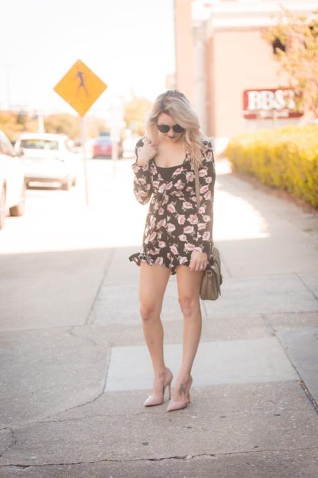 Black floral romper from Mo and Cho Boutique; pair with a pair of pumps for the perfect nighttime look. 