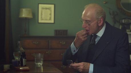 Judge Wargrave’s Navy Suit in And Then There Were None Wargrave self-medicates. Note the eyeglasses that he typically carries attached via cord in his jacket's barchetta pocket.