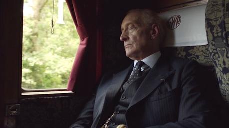 Judge Wargrave’s Navy Suit in And Then There Were None Wargrave dozes off for his introduction to the audience in the first episode.